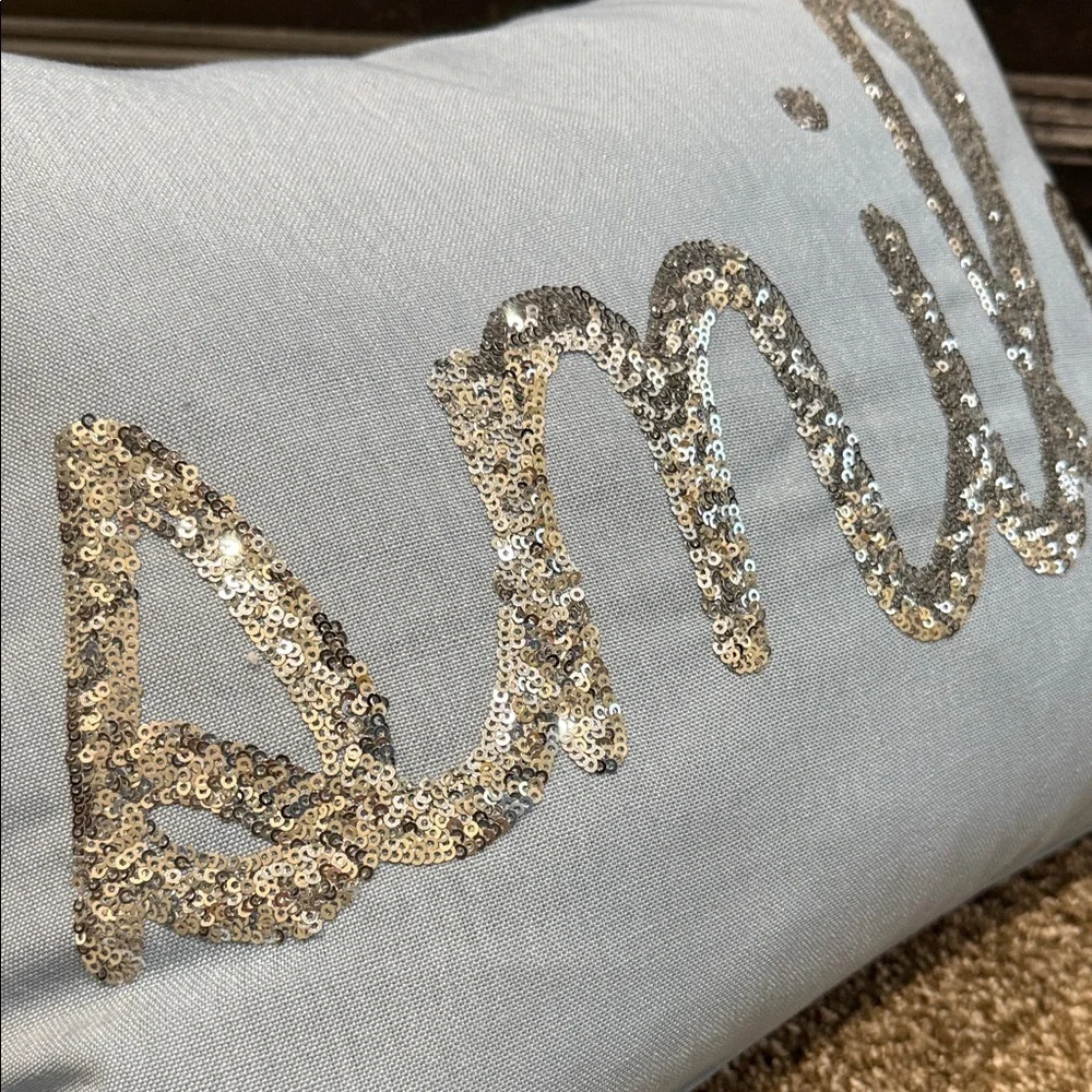 Blue Decorative Pillow with Silver 'Smile' Design
